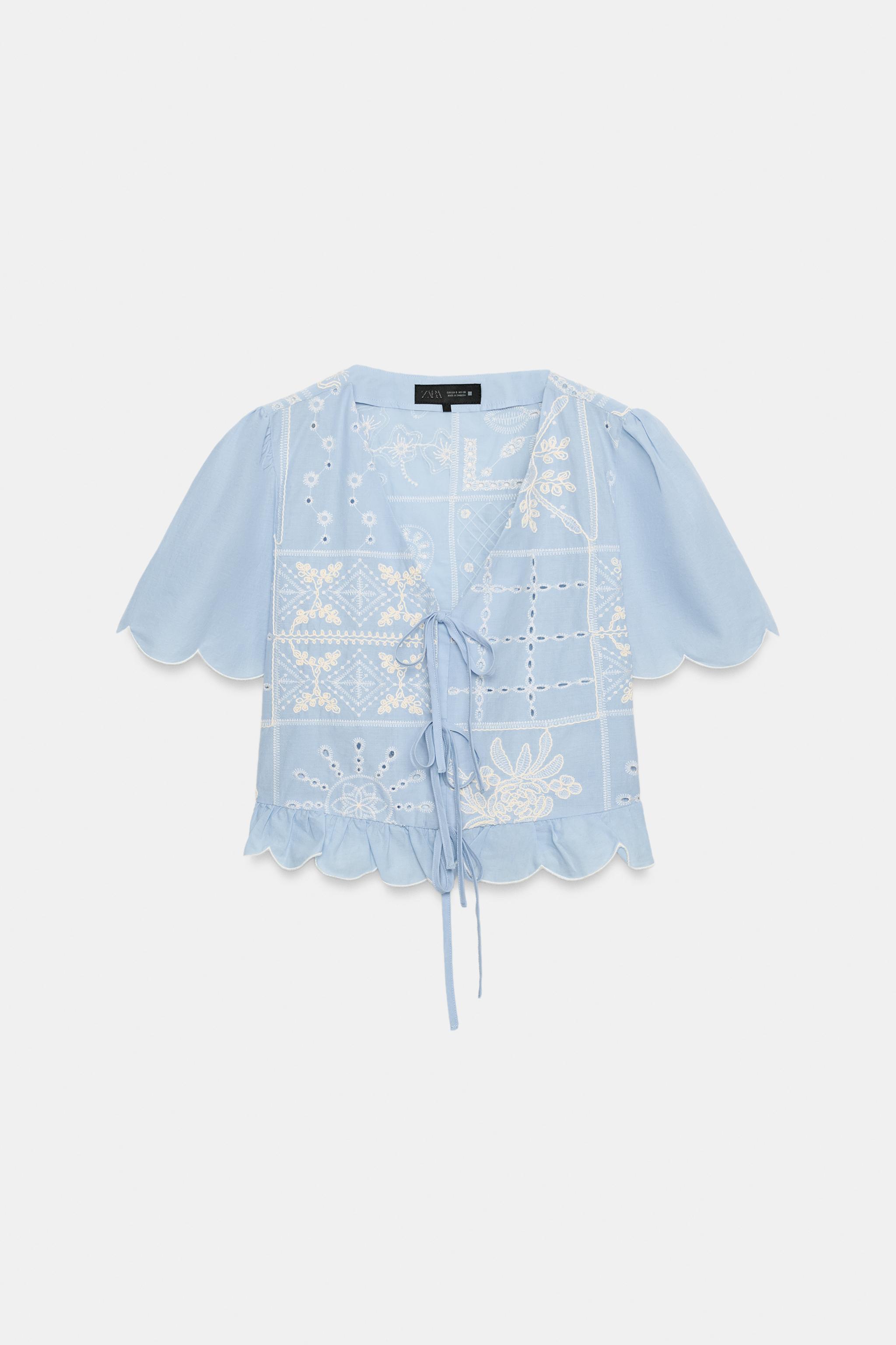 BLOUSE À LACETS ET BRODERIES PERFORÉES